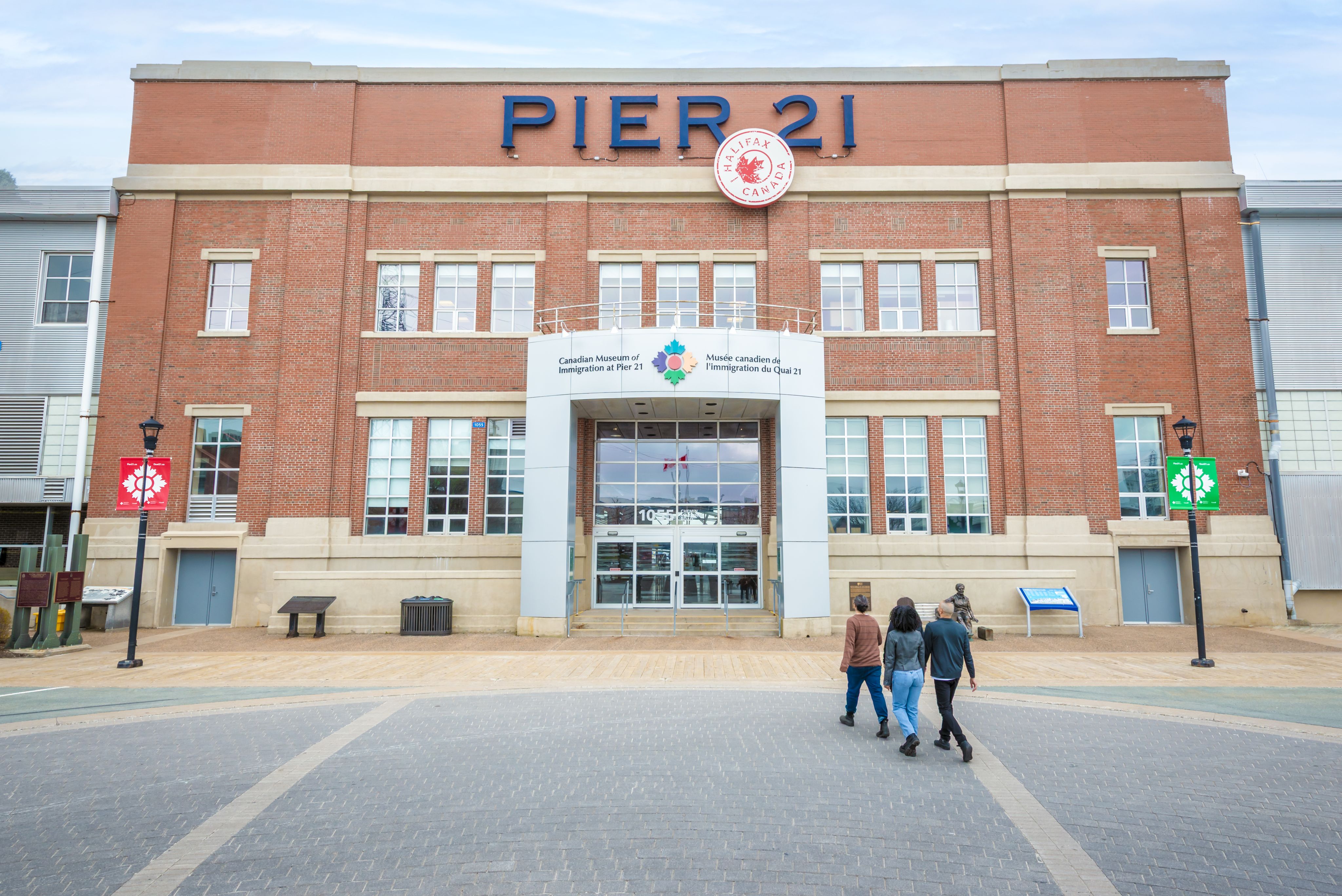 brown rock formation near body of water during daytime
